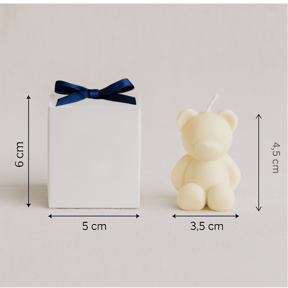 Measurement chart showing a white box with a blue ribbon and a bear-shaped candle on a light gray background.